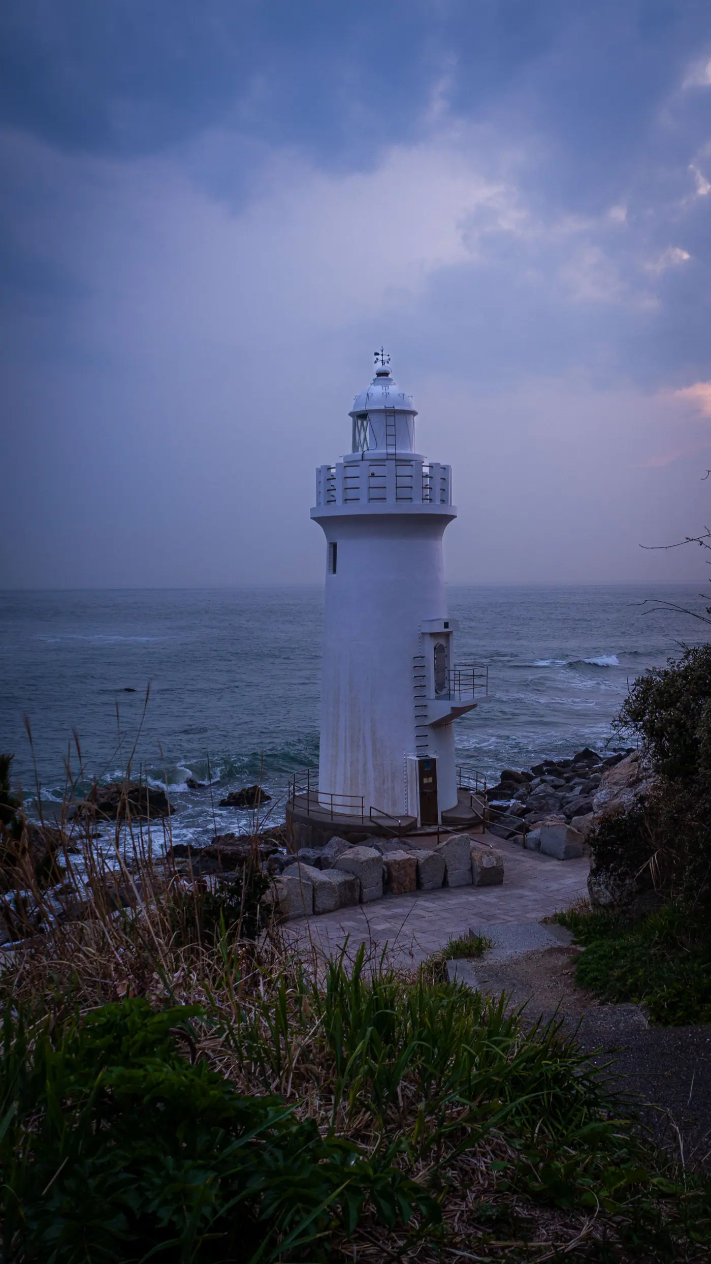 Irago Lighthouse under a purple evening sky