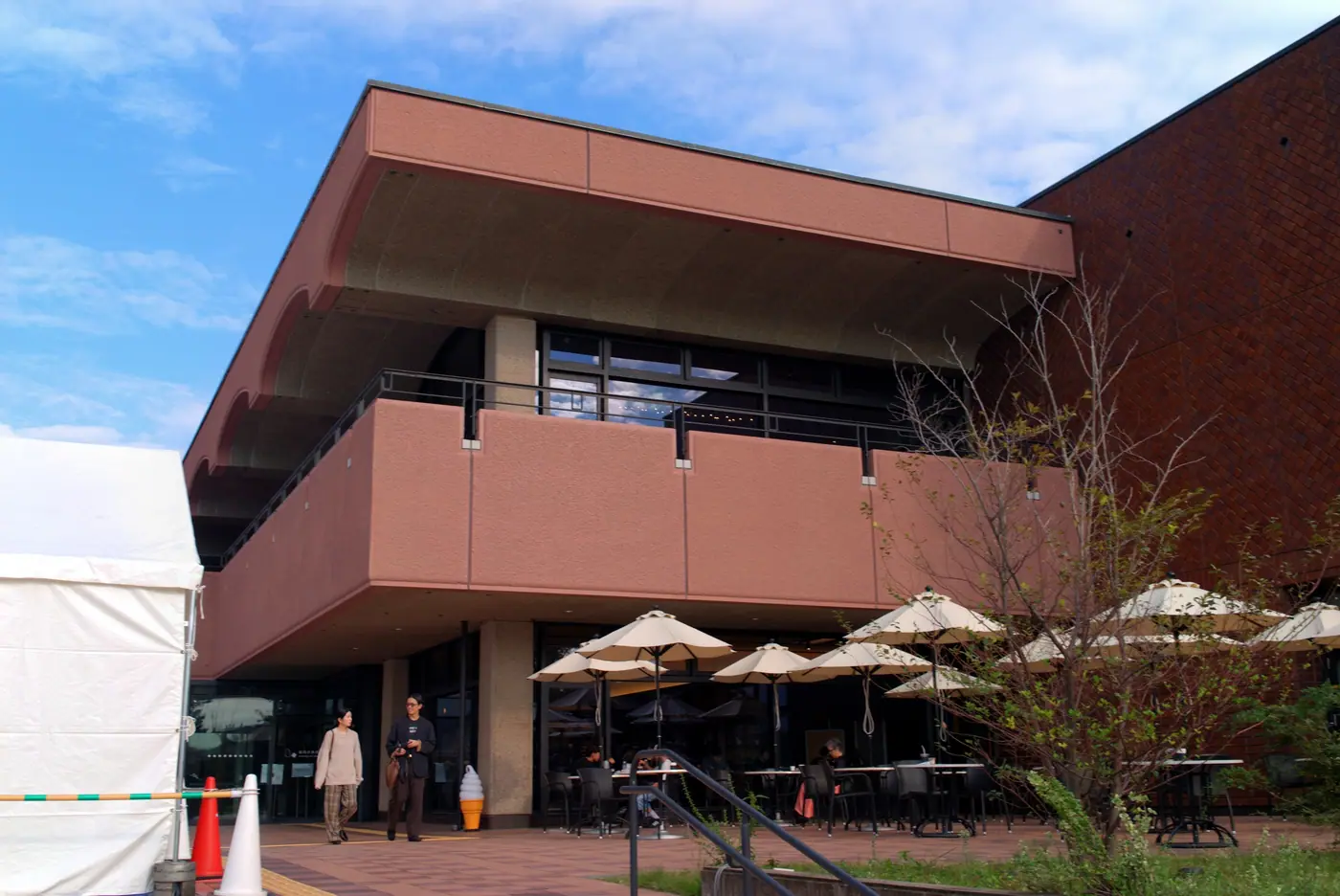 The brick Fukuoka Art Museum and its outdoor cafe in Ohori Park