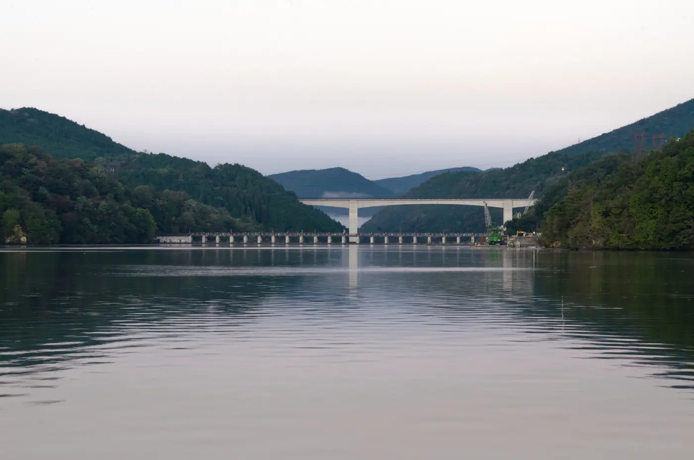 Calm water and a bridge across Enakyo