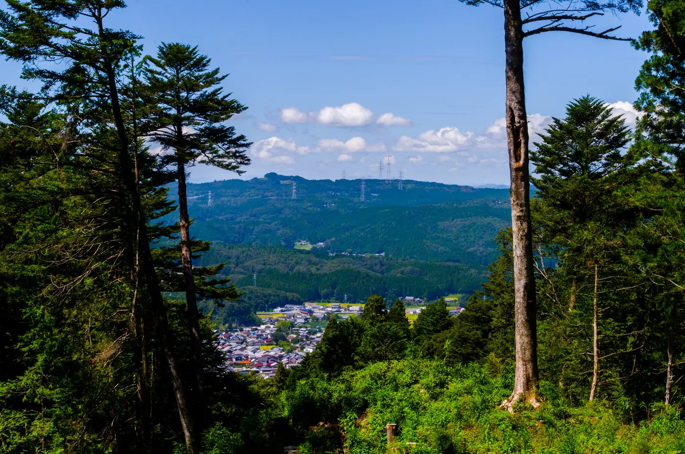 A view over the mountains and the town below from Iwamura Castle