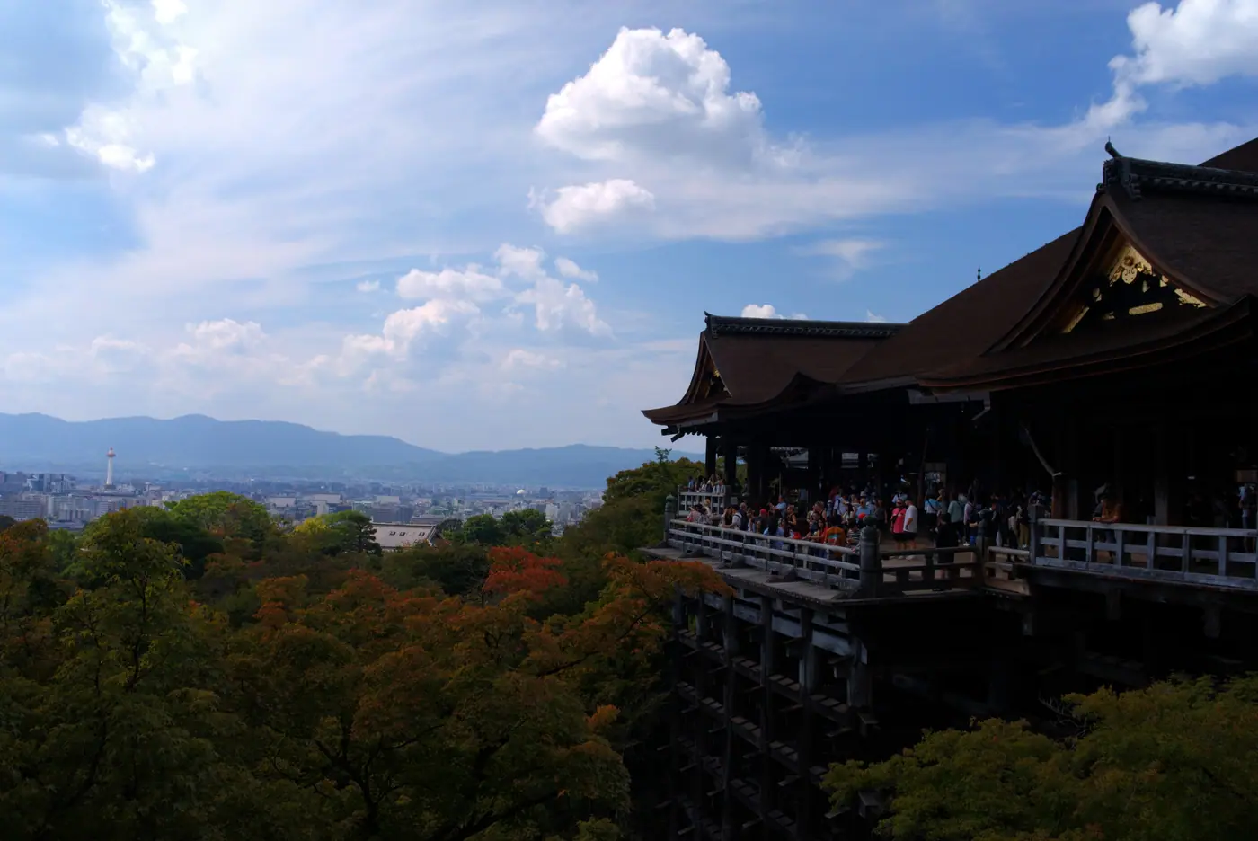 The stage of Kiyomizu-dera jutting out over the trees, with Kyoto beyond