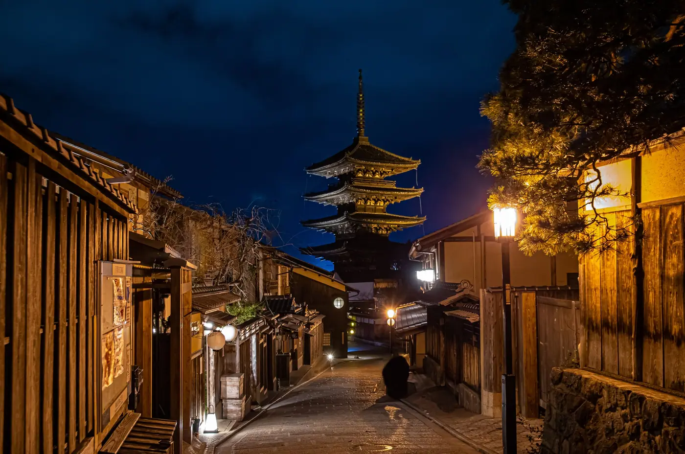 Yasaka Pagoda at the end of a lantern-lit lane at dusk