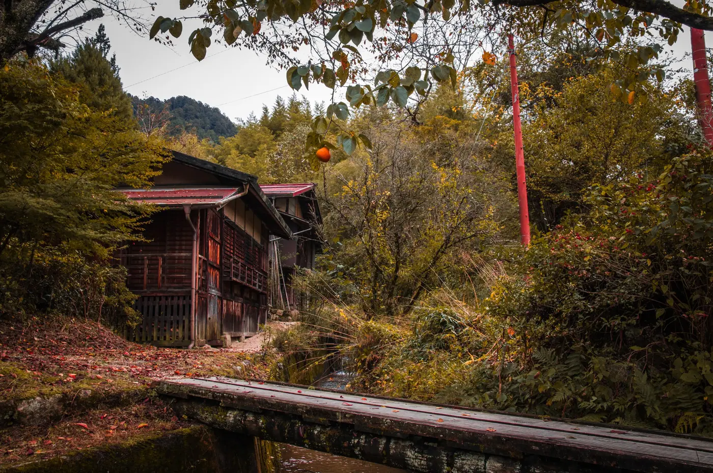 A traditional wooden house in autumn at Tsumago-juku